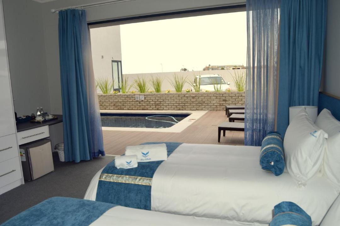 Blue Whale Hotels Уолфиш-Бей Экстерьер фото